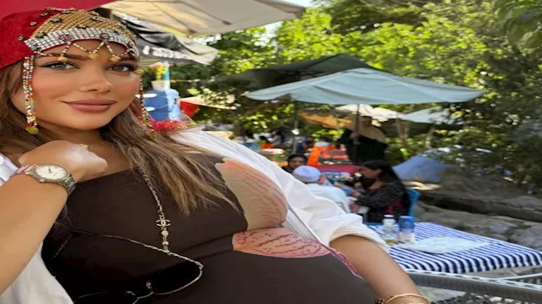 زوجة محمد النني تمتلك علامة تجارية وتظهر في 15 صورة بارزة